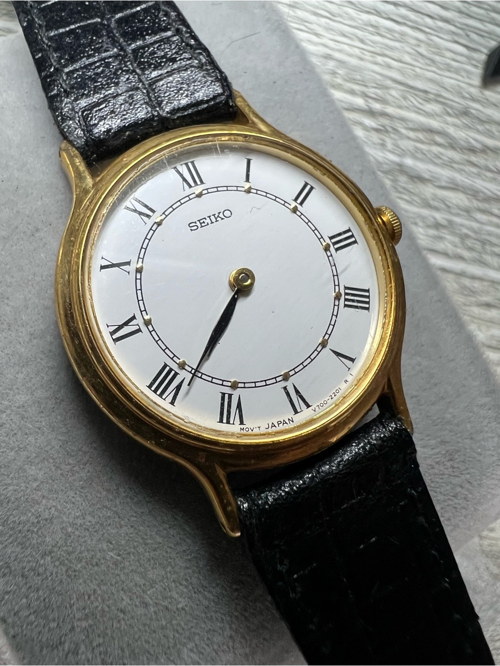 Seiko Gold-Tone Case White Roman numeral Dial Black Leather Strap Watch